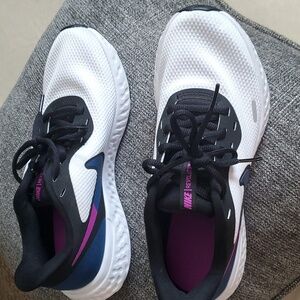 Like new Nike Revolution size 7-1/2 white with black teal and purple